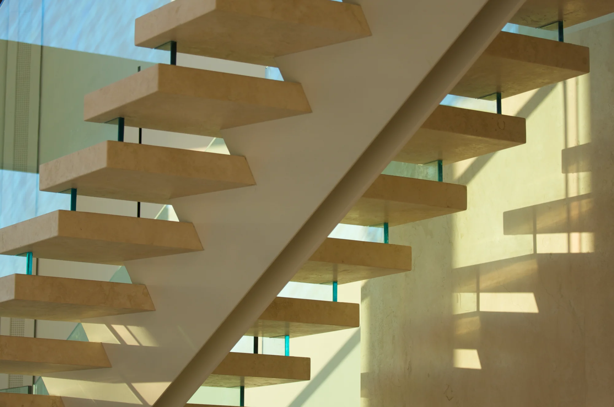A high-quality central stringer staircase with wooden steps